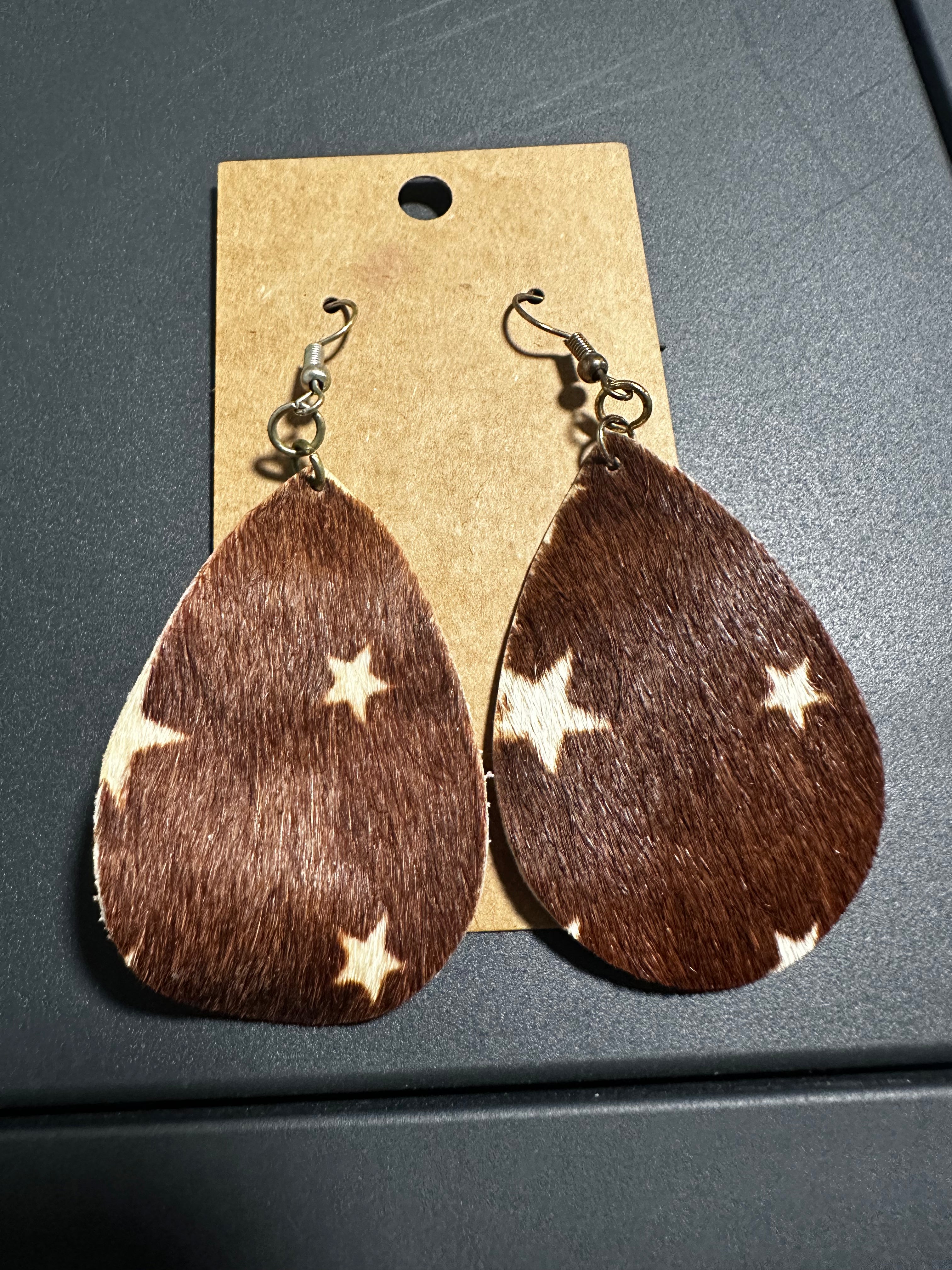 Cowhide star earrings