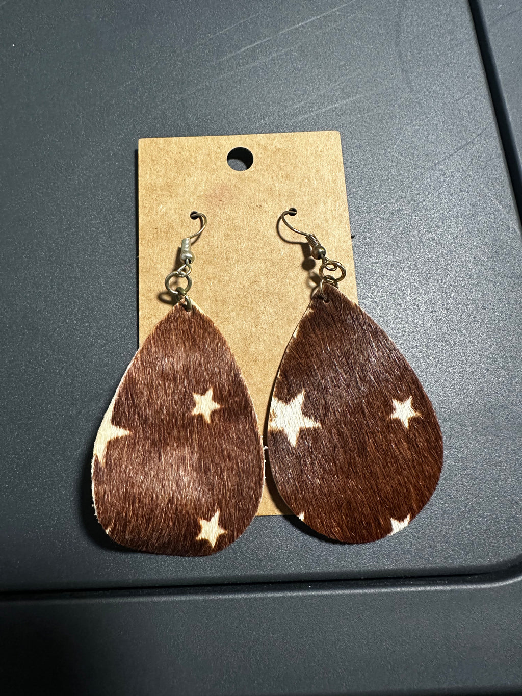 Cowhide star earrings
